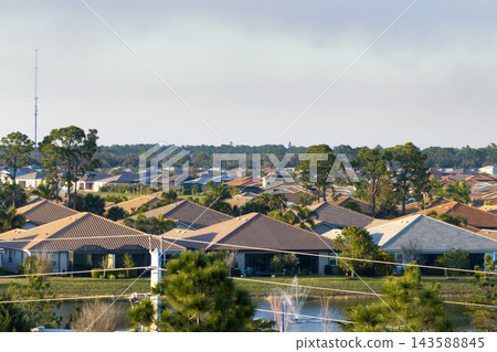 Residential neighborhood in Florida with suburban houses. Development of US premium housing 143588845