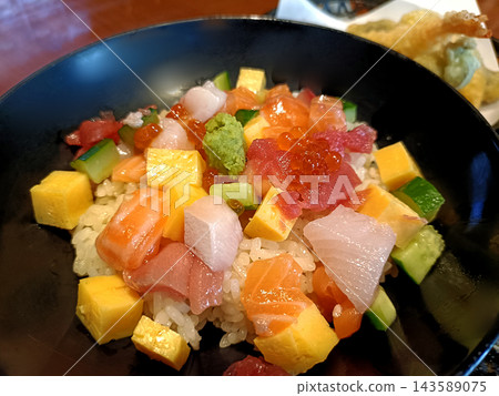 A vibrant seafood rice bowl A vibrant seafood rice bowl 143589075
