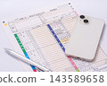 Tax return form, smartphone, and pen 143589658