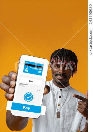 User showing a mobile payment screen and pointing at it in front of an orange background User showing a mobile payment screen and pointing at it in front of an orange background 143590680