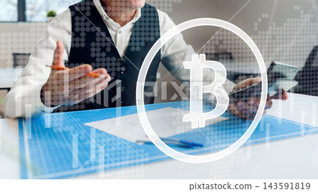 Business person discussing cryptocurrency trends while showing a mobile device in a modern office setting 143591819