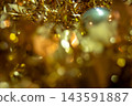 Horizontal picture of golden abstract background.Christmas holiday concept. Ideal for greeting messages or promotions.Social media background. High quality real picture. 143591887