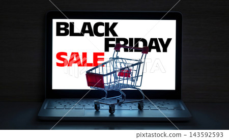 Black Friday sale with shopping cart on laptop screen showing discount offers 143592593