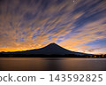 Mount Fuji against the flowing sunrise sky as seen from Lake Tanuki 143592825