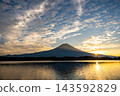 Fuji seen from Tanuki Lake and the sunrise 143592829