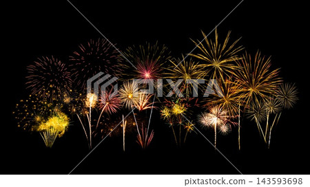 Fireworks of various colors and shapes burst in night sky Fireworks of various colors and shapes burst in night sky 143593698