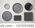 Assortment of black tableware 143593888