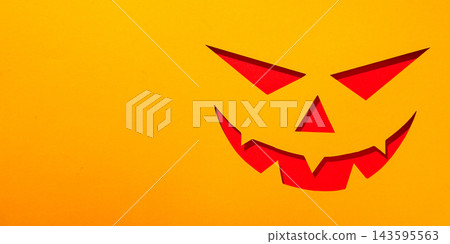 Halloween. Colorful paper pumpkin cutout adds fun touch for Halloween events Halloween. Colorful paper pumpkin cutout adds fun touch for Halloween events 143595563
