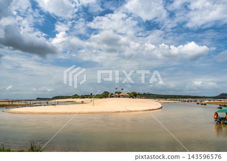 Alter do Chao, Brazil - Dec 15, 2025: The lovely beach of Ilha do Amor in Alter do Chao, Brazil Alter do Chao, Brazil - Dec 15, 2025: The lovely beach of Ilha do Amor in Alter do Chao, Brazil 143596576