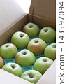 Bramley apples in a cardboard box 143597094