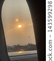 Airplane sunset 143599298
