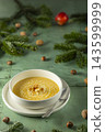 Pumpkin soup with croutons for festive Christmas dinner 143599999