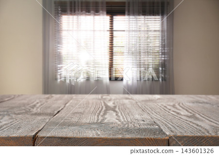 Empty wooden table in room. Space for design 143601326