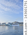 A photograph of the Norwegian Jade cruise ship docked at Hakodate Port in Hakodate City, Hokkaido. 143601791
