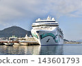 A photograph of the Norwegian Jade cruise ship docked at Hakodate Port in Hakodate City, Hokkaido. 143601793