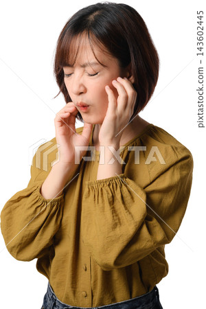 Stressed young asian woman touching cheeks with pain expression while shopping during black friday sale promotion discount event with isolated background for marketing campaign Stressed young asian woman touching cheeks with pain expression while shopping during black friday sale promotion discount event with isolated background for marketing campaign 143602445