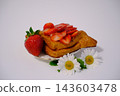 Golden puff pastry with fresh strawberries and strawberry filling close up on white background homemade summer bakery delight 143603478