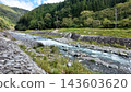 A mountain village and the scenery of the Shiokawa River flowing through the mountain stream - Ooshika Village, Shimoina District, Nagano Prefecture, Japan 143603620