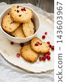 Homemade biscuits. Crunchy dessert. Biscotti served on white rustic ceramic plate with fresh red berries. Healthy food background. 143603967