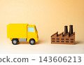 A truck and an industrial plant. Cargo transportation and haulage. Logistics and supply. 143606213
