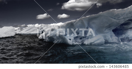 icebergs in the ocean icebergs in the ocean 143606485