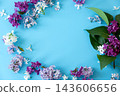 Fresh lilac branches arranged on soft blue background 143606656
