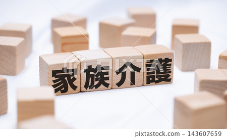 Wooden blocks with texts on family caregiving Wooden blocks with texts on family caregiving 143607659
