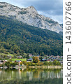 Grundlsee village reflecting alpine mountains and autumn forest 143607766
