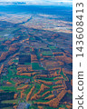 A panoramic aerial view of the Daisetsuzan mountain range and autumn foliage in Hokkaido. 143608413