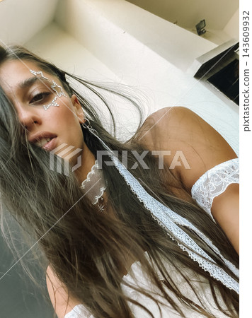 Bride With Long Hair In Close Portrait Bride With Long Hair In Close Portrait 143609932