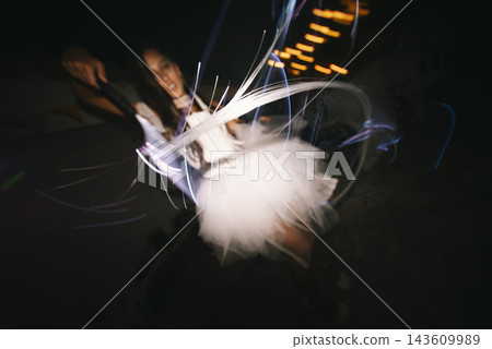 Bride Dancing Beneath Streaks Of Night Lights Bride Dancing Beneath Streaks Of Night Lights 143609989