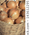 Vegetables in wicker basket on stand at bazaar. Food containing minerals and vitamins 143612295