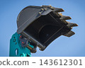 Shovel of excavator or bulldozer on sky background. Part of industrial machinery. Technology 143612301