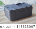 side view antique black printers on wooden floor background, technology, object, comfortable, work, copy space 143613007