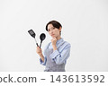 The image of a woman struggling in the kitchen 143613592