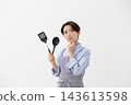 The image of a woman struggling in the kitchen 143613598