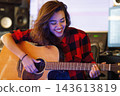 female, guitarist, person 143613819