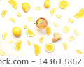 Top view flat lay of clear glass tea cup filled with lemon slices, ginger, and fresh mint on white background, surrounded by scattered lemon wedges. Fresh healthy immune boosting beverage concept. 143613862