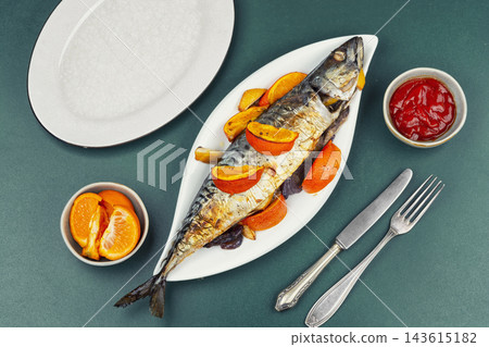 Homemade roasted mackerel with mandarin slices Homemade roasted mackerel with mandarin slices 143615182