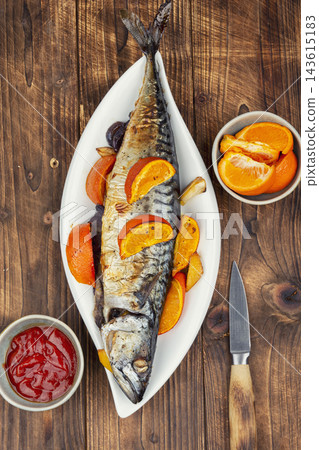 Gourmet baked mackerel with orange and mandarin Gourmet baked mackerel with orange and mandarin 143615183