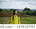 Portrait of a woman hiking in the Shibusawa Hills 143616783