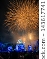A large flower blooming in the night sky 143617741
