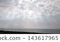 Light shining into the sea 143617965