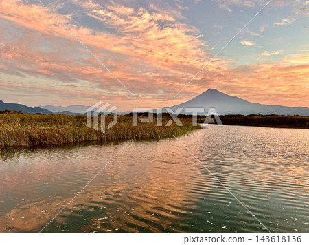 Sunrise and Mount Fuji as seen from the Fujikawa River Sunrise and Mount Fuji as seen from the Fujikawa River 143618136