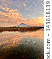 Mount Fuji and morning-colored clouds 143618139