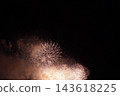 Fireworks that draw a beautiful parabola in orange color 143618225