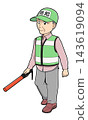 A male crime prevention volunteer walking with a traffic wand - 03 143619094