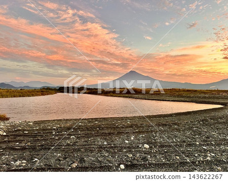Mount Fuji and the sunrise as seen from the Fujikawa River Mount Fuji and the sunrise as seen from the Fujikawa River 143622267