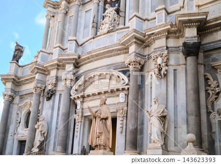 Historic Baroque architecture and stone sculptures at the Cathedral of Saint Agatha, Italy Historic Baroque architecture and stone sculptures at the Cathedral of Saint Agatha, Italy 143623393