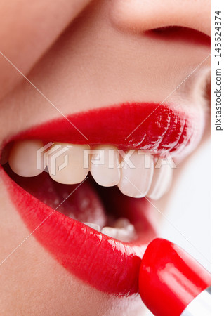 Woman, apply and mouth for lipstick in studio, makeup and cosmetics for care on white background. Female person, red and skincare or silver tube, grooming and aesthetic of gloss or skin treatment 143624374